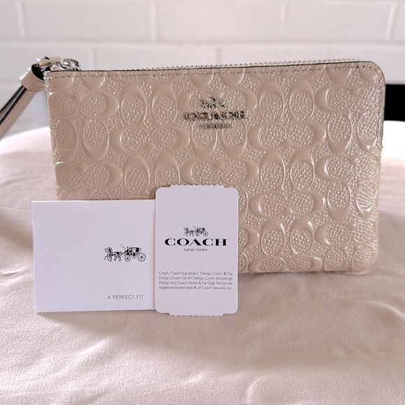 Coach Handbags - Pearlized Coach Wristlet